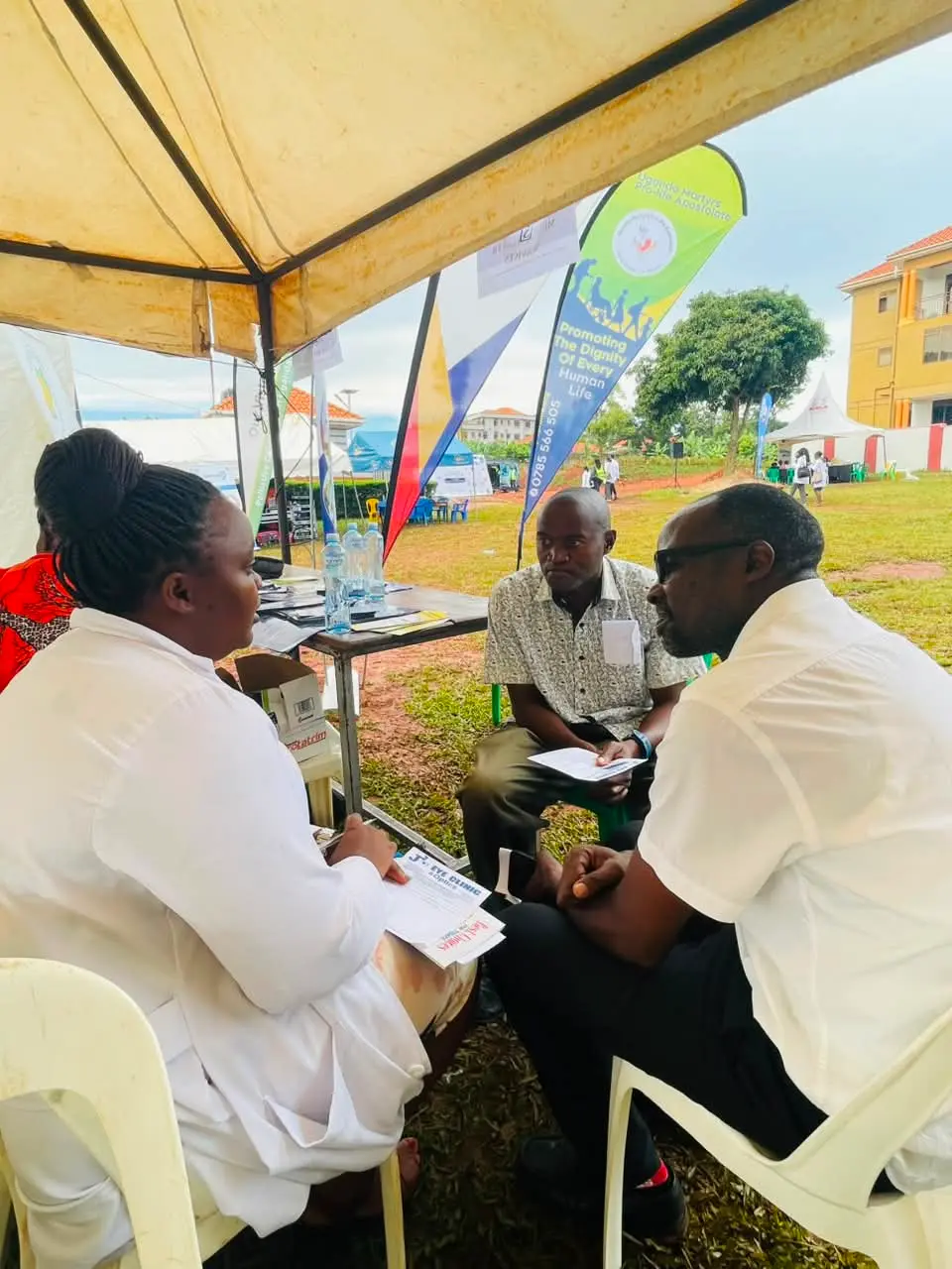 A Serenity Minds clinician listening to a man during an outreach consultation